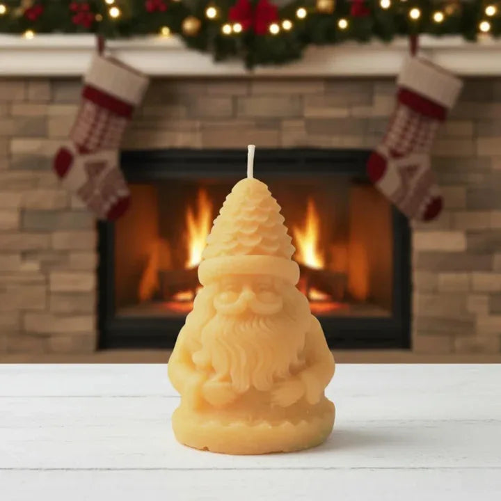 Santa Claus candle placed in Christmas home Decor setting with lights and festive background