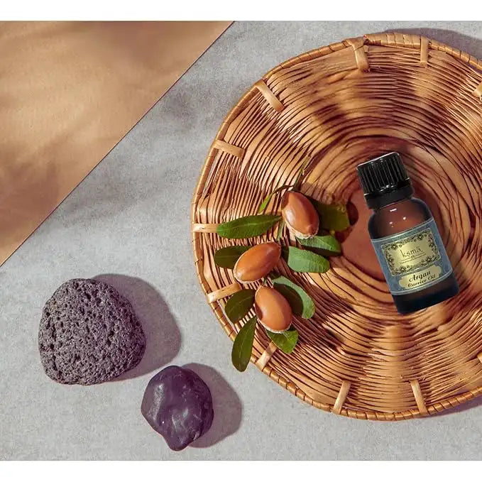 Argan oil bottle with argan nuts display
