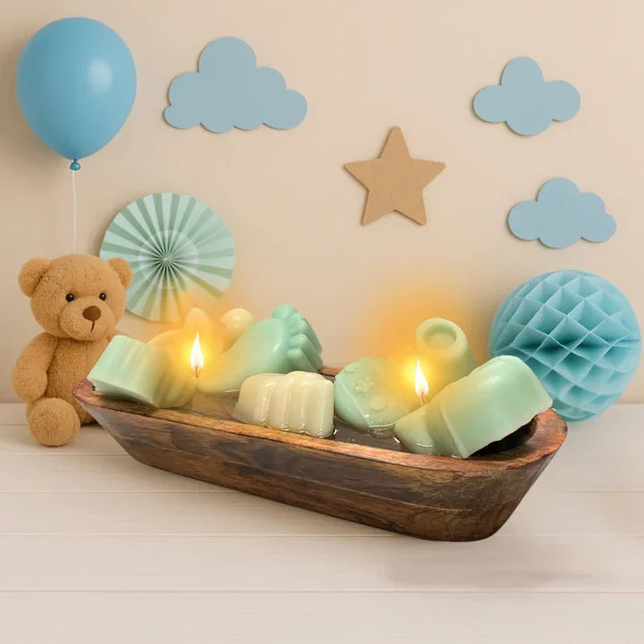 Baby boy blue theme candle hamper with decorative setup and teddy