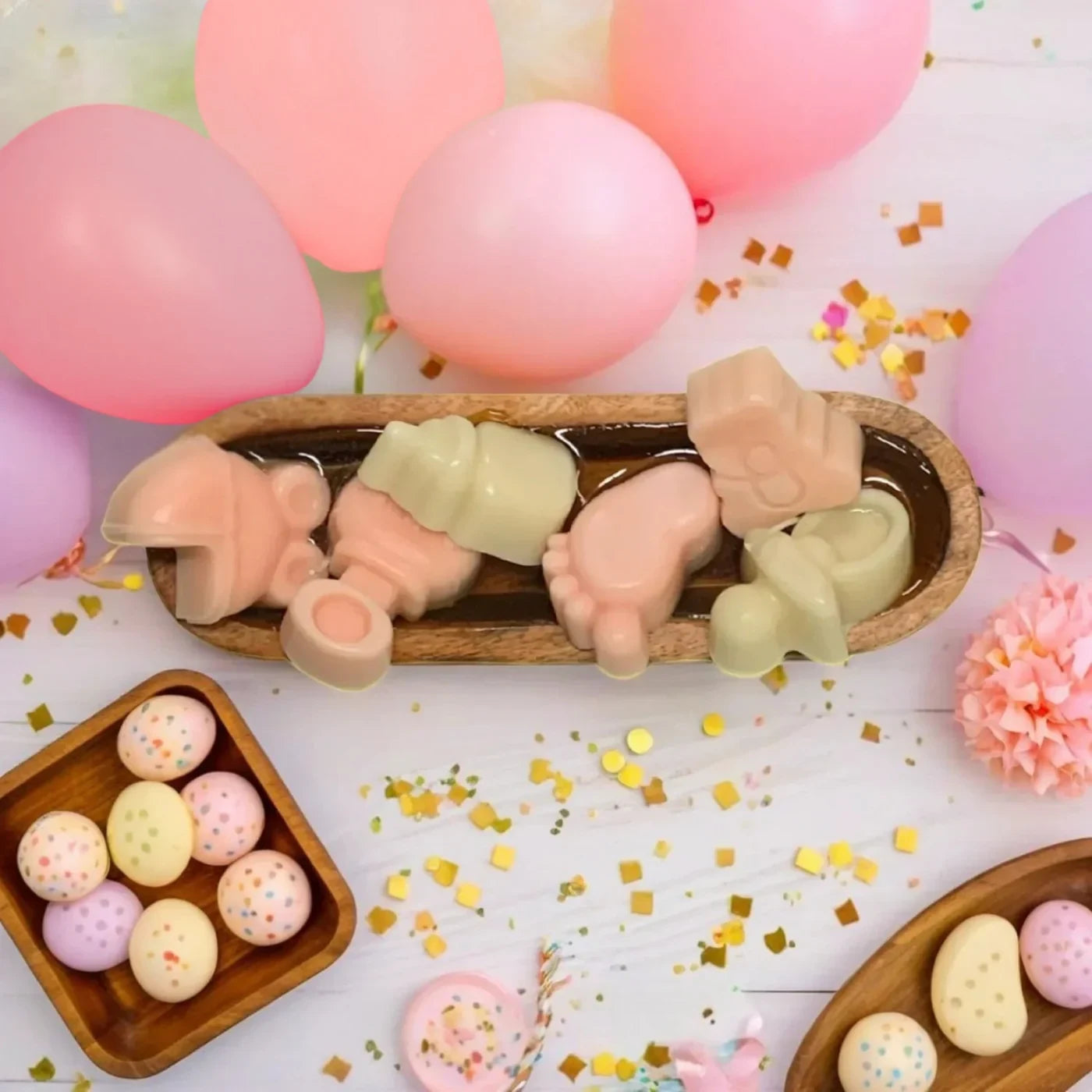 Pink theme baby gift hamper with candles and decorative items