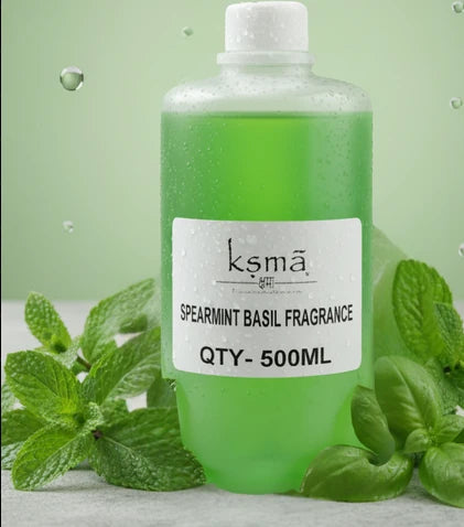 Basil fragrance oil product display with green basil leaves