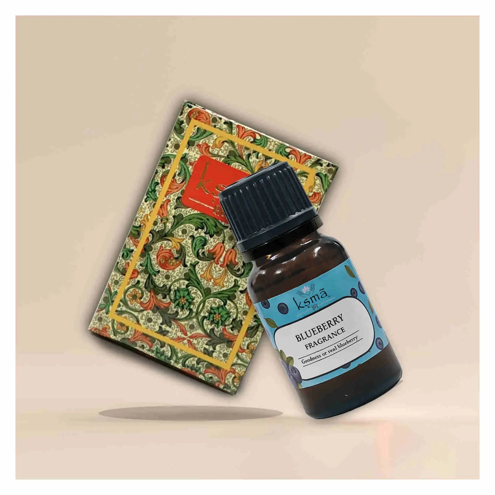 Close-up of blueberry fragrance oil bottle showing label and cap