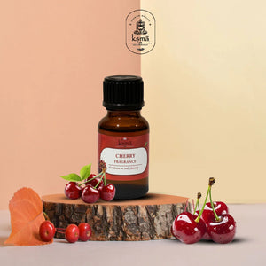 Cherry fragrance oil bottle with cherry fruits product display on aesthetic background