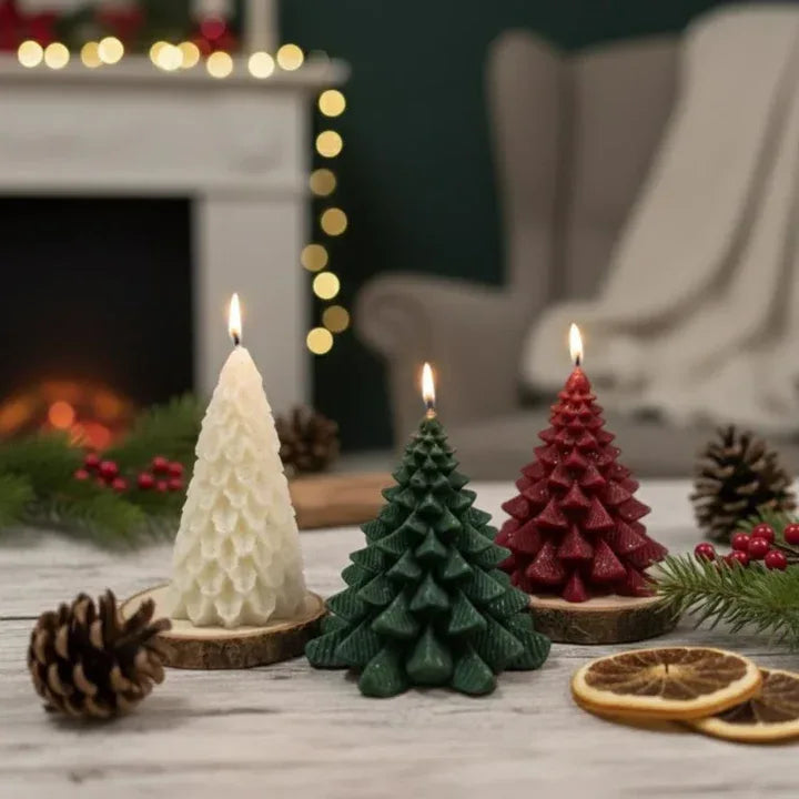 Tree shaped candles arranged on table with lights and decorative elements for festive display