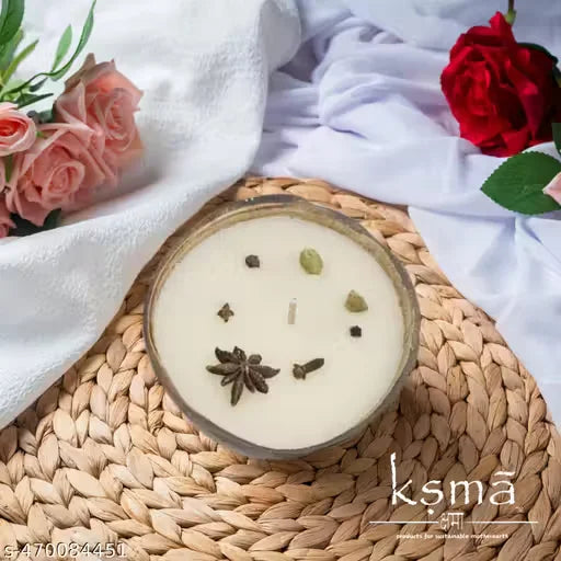 Top view of coconut shell candle with decorative elements and styling