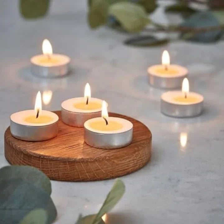 Floating tealight candles in water bowl decorative candle arrangement