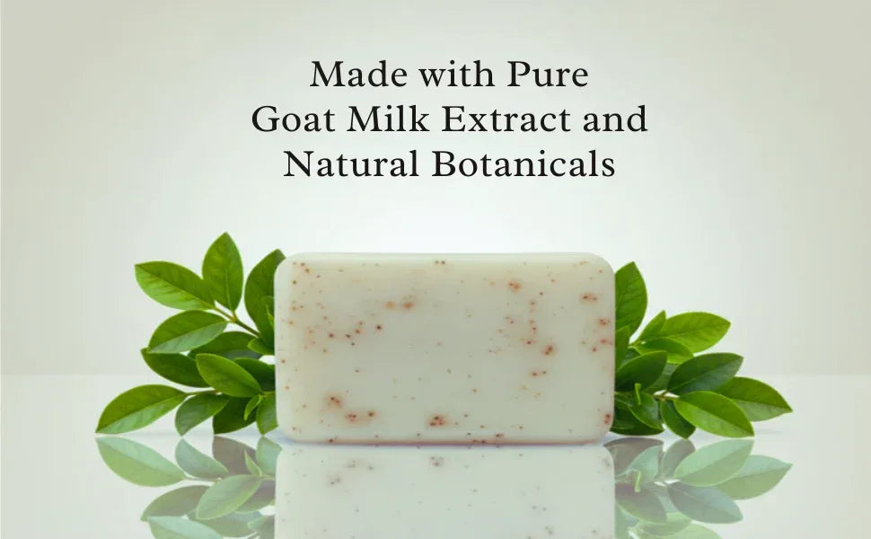 Handcrafted goat milk and mandarin soap with green leaves and ingredient display