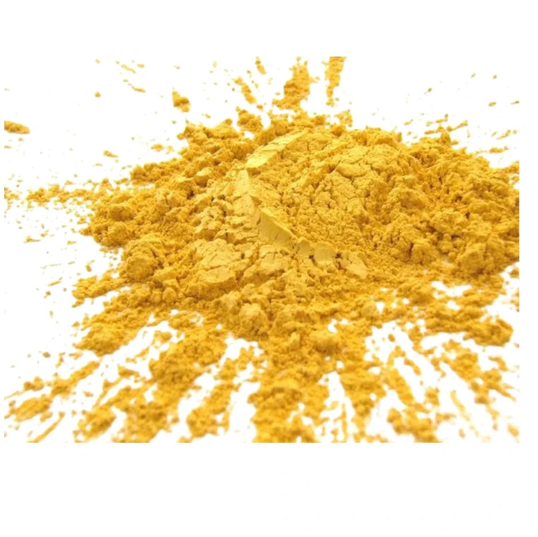 Gold candle pigment powder spread showing fine texture and rich color for wax use