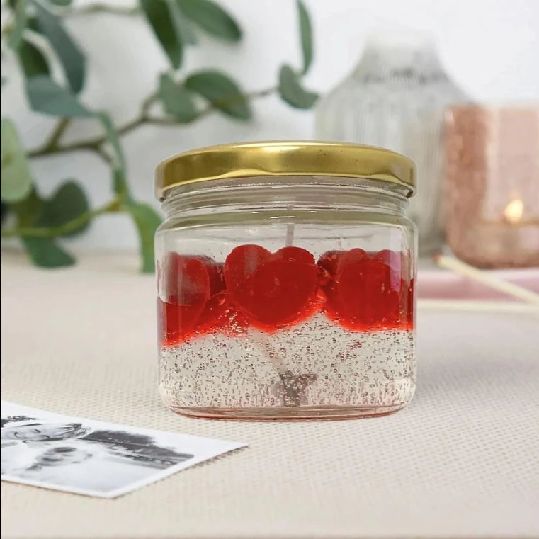 Heart design glass jar candle placed for room decoration