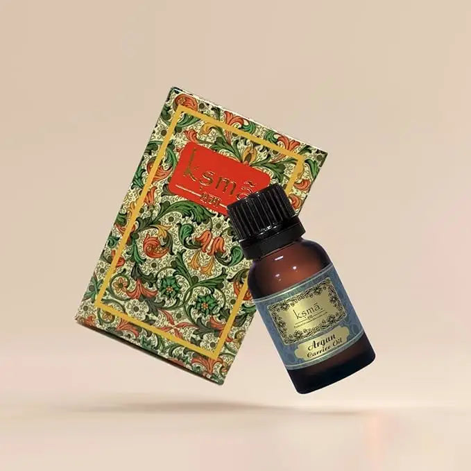 KSMA argan oil bottle with decorative background