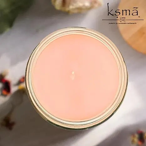 Close-up view of scented candle wax texture inside elegant glass jar