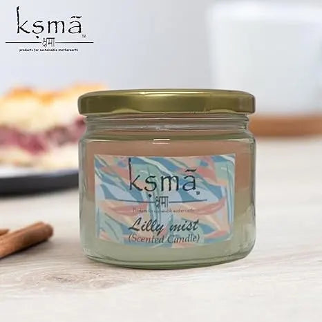 Lilly Mist glass jar candle placed on table with soft natural lighting and minimal background