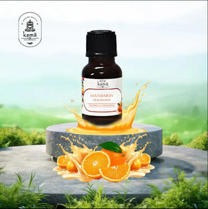 Mandarin fragrance oil bottle with citrus splash and fresh mandarin slices in product display
