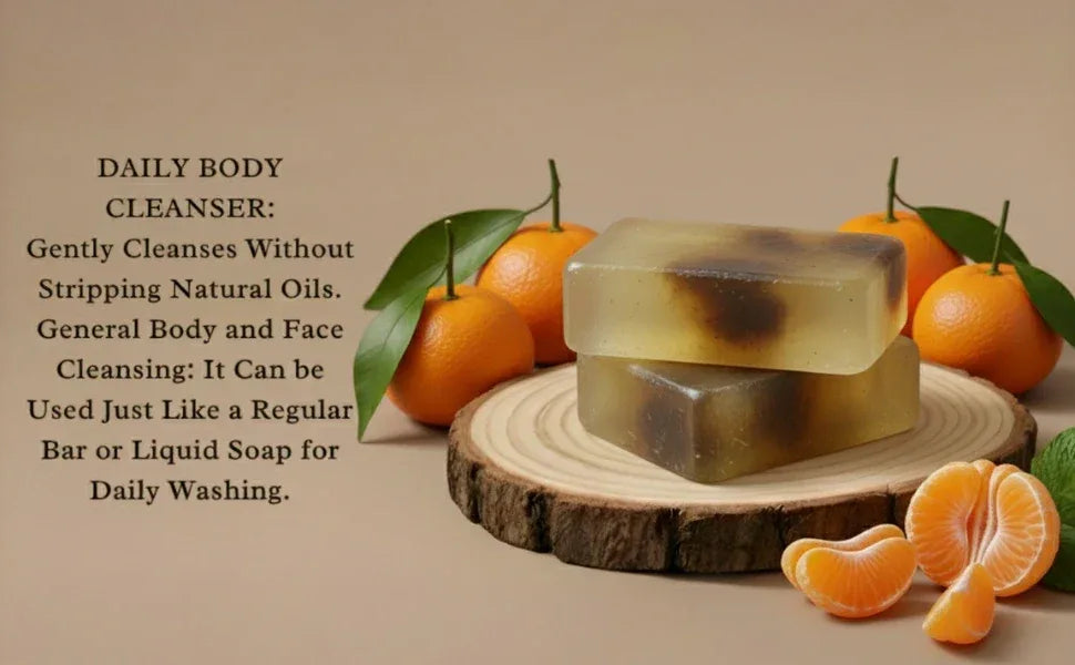 Luxury handcrafted mandarin soap placed with fresh mandarin fruits