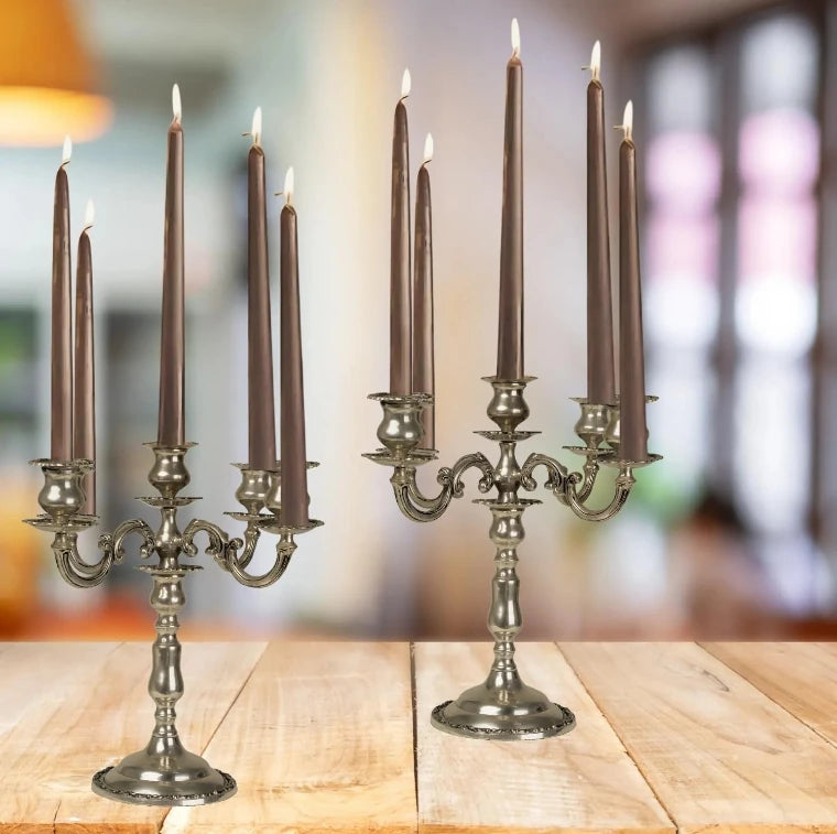 Set of 4 mocha long pillar candles placed in candle holders