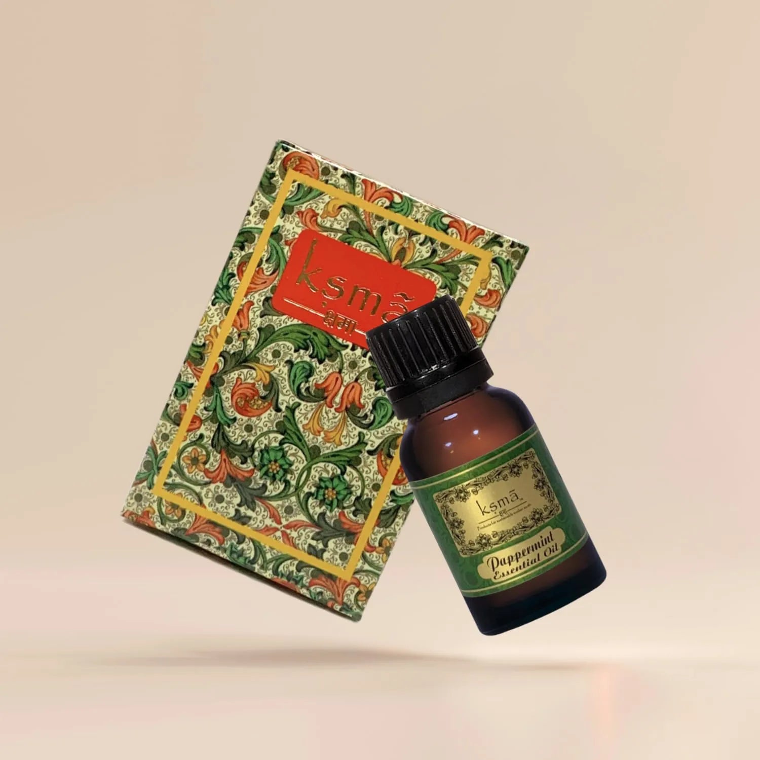Peppermint essential oil bottle with decorative packaging box