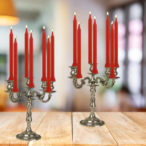 Red pillar candle set of 12 displayed on metal stand for home decor and festive use