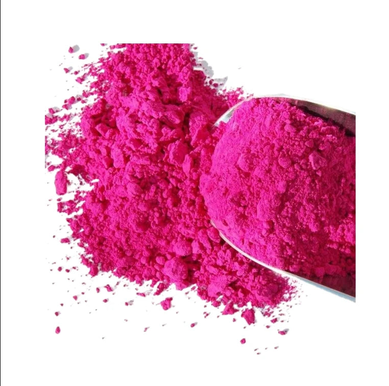 Close up of pink pigment powder used for candle dye and wax color