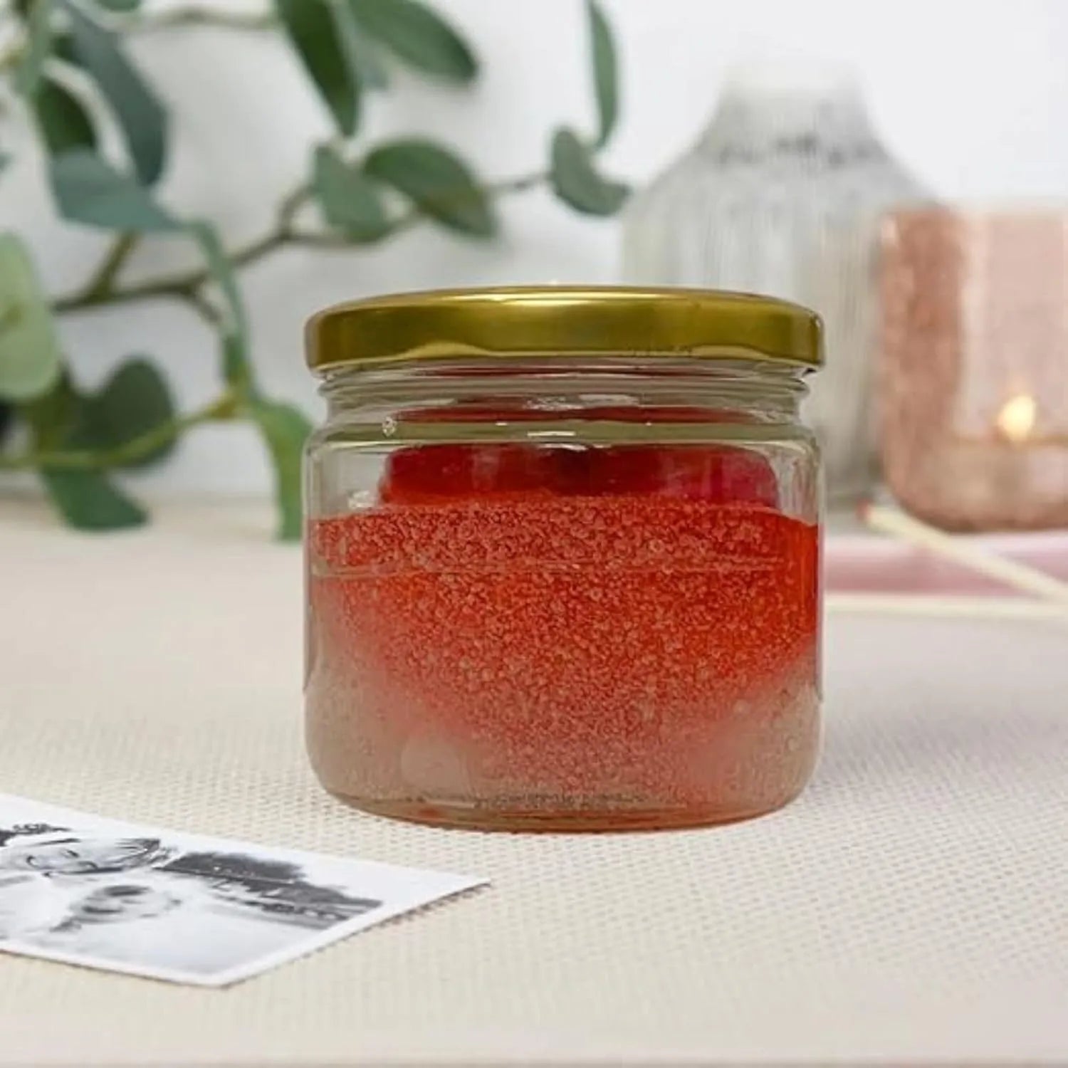 red heart jar candle with plant background modern home decor candle