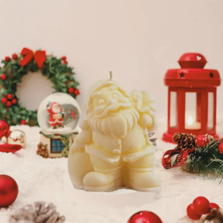 Set of Santa Claus bag design candles arranged together for festive display