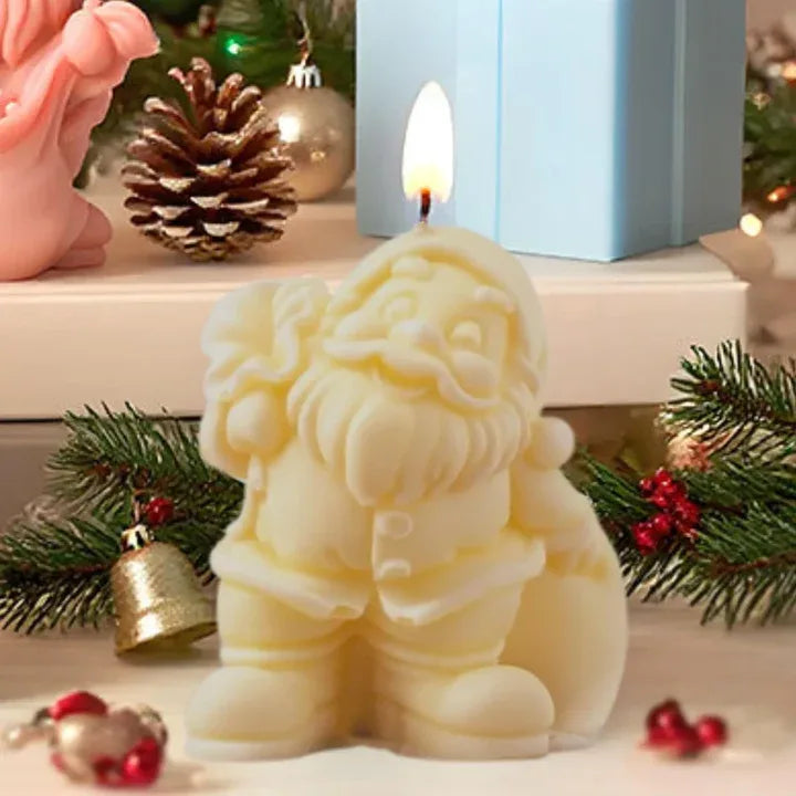 Santa Claus bag design decorative candle with coco vanilla fragrance front view on table