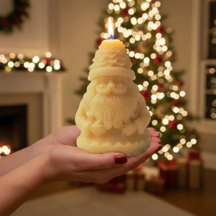 Close up of Santa Claus candle showing detailed carving and smooth wax texture