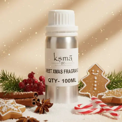 Sweet Xmas fragrance oil bottle placed with Christmas decorations like cookies and festive elements