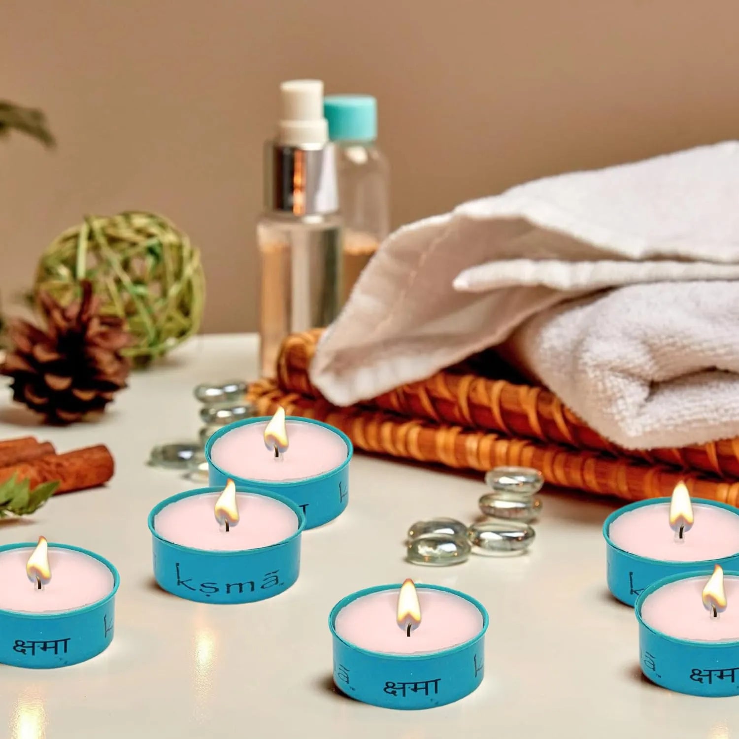 Tealight candles placed in a cozy home setting creating a warm ambience