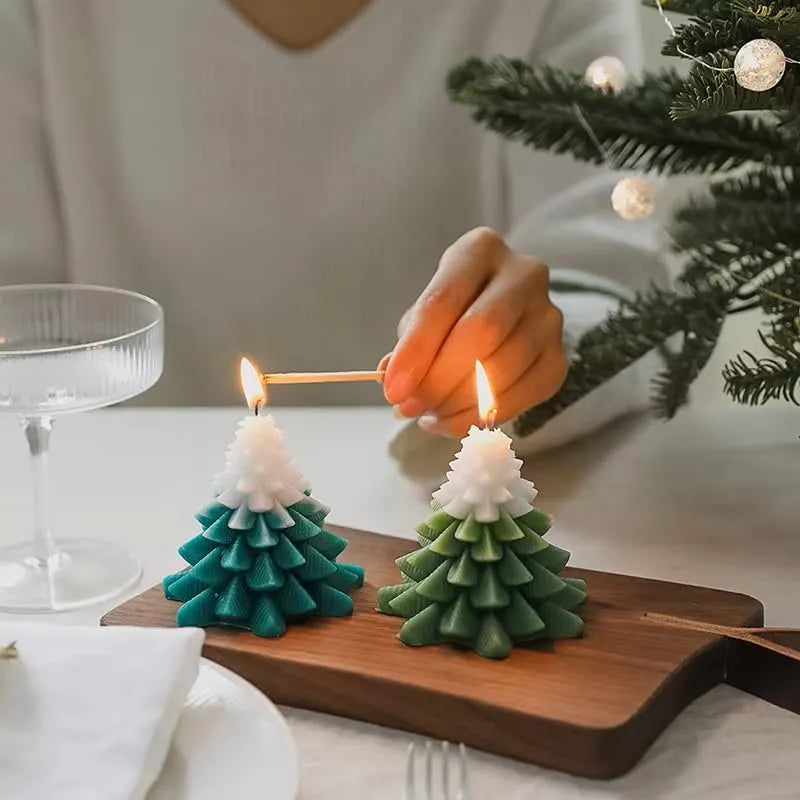 Decorative tree candle placed on tray with aesthetic home decor elements