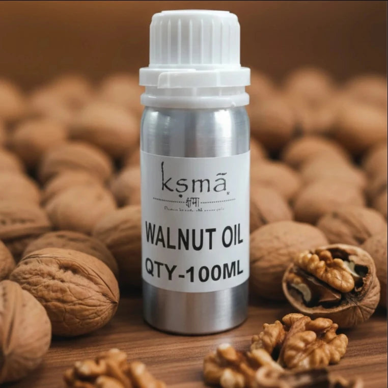 Walnut oil bottle placed with whole walnuts showing product source and usage