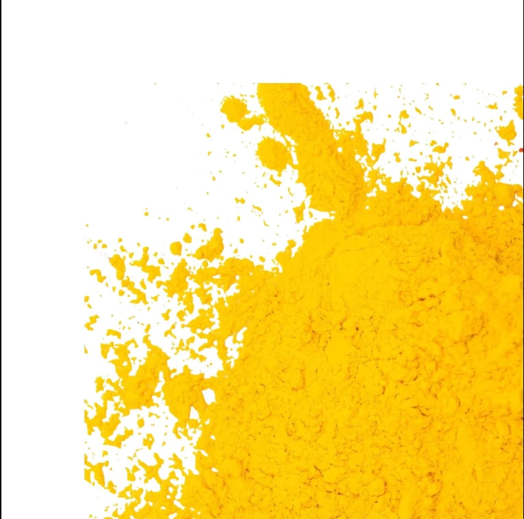 Yellow pigment powder spread showing fine texture for candle dye